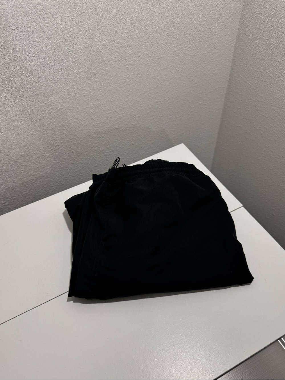 Black track pants
